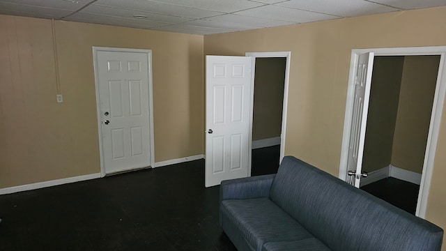 4107 N Campbell St, Detroit, MI 48210 - living area featuring baseboards and a drop ceiling