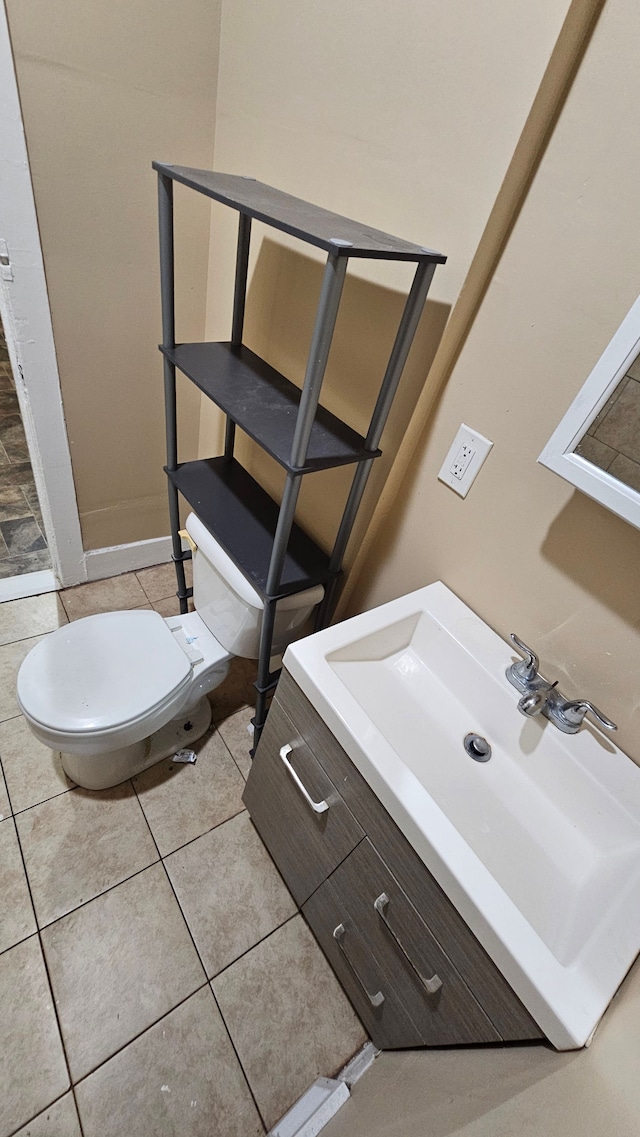 4107 N Campbell St, Detroit, MI 48210 - half bath featuring toilet, tile patterned flooring, and vanity
