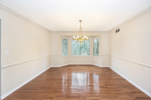 5521 Lohr Lake Dr, Ann Arbor, MI 48108 - spare room with wood finished floors, a chandelier, baseboards, and crown molding