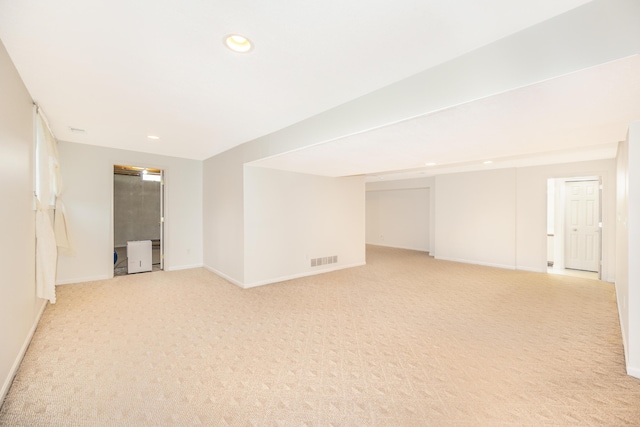 5521 Lohr Lake Dr, Ann Arbor, MI 48108 - below grade area with recessed lighting, light carpet, and baseboards