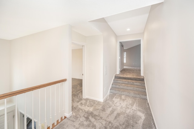 5521 Lohr Lake Dr, Ann Arbor, MI 48108 - hallway with carpet floors, baseboards, an upstairs landing, and recessed lighting