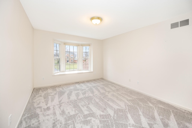 5521 Lohr Lake Dr, Ann Arbor, MI 48108 - carpeted spare room featuring baseboards
