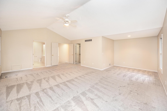 5521 Lohr Lake Dr, Ann Arbor, MI 48108 - spare room with ceiling fan, light colored carpet, vaulted ceiling, and baseboards
