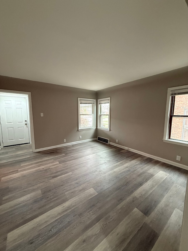 18655 Strasburg St, Detroit, MI 48205 - spare room with wood finished floors and baseboards