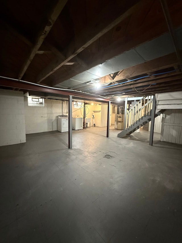 18655 Strasburg St, Detroit, MI 48205 - unfinished below grade area featuring stairs and washer and dryer