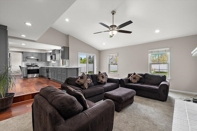 living room featuring dark wood-style floors, recessed lighting, ceiling fan, and baseboards