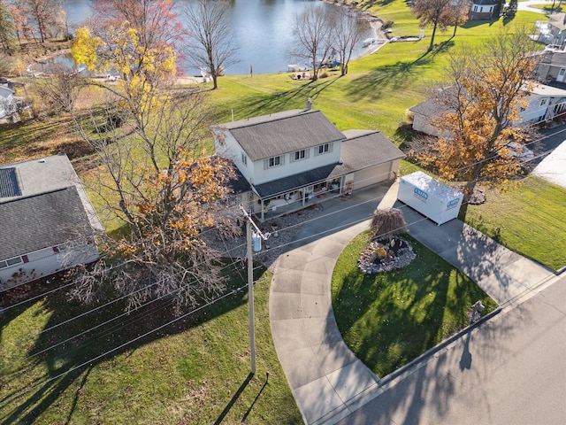 drone / aerial view with a water view