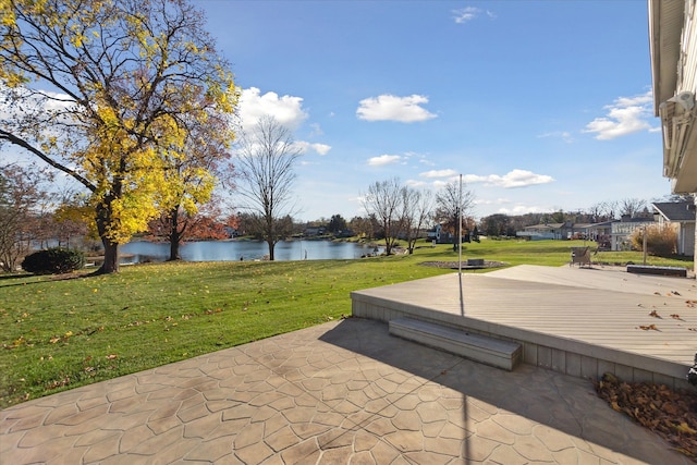 view of patio with a water view