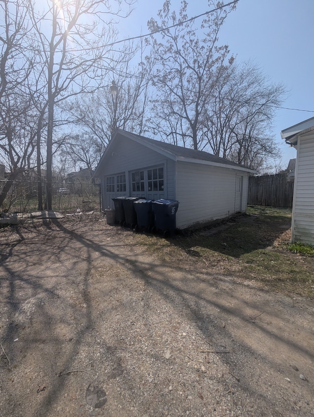 view of property exterior with fence