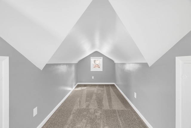 13955 Prevost St, Detroit, MI 48227 - bonus room with baseboards, lofted ceiling, and carpet
