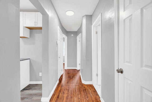 13955 Prevost St, Detroit, MI 48227 - corridor with baseboards and wood finished floors