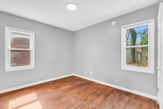 13955 Prevost St, Detroit, MI 48227 - unfurnished room with baseboards and wood finished floors