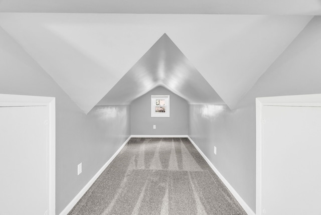 13955 Prevost St, Detroit, MI 48227 - additional living space with carpet flooring, baseboards, and vaulted ceiling