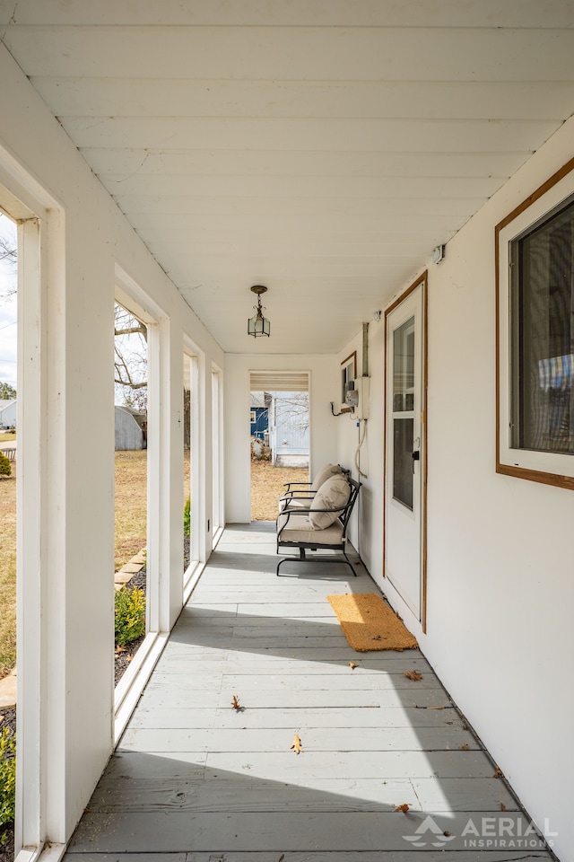 wooden deck featuring a porch