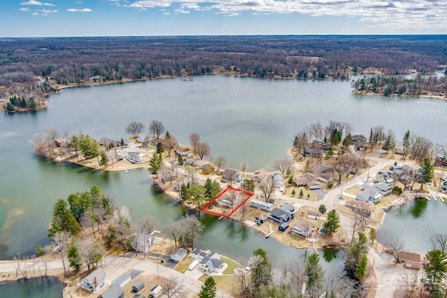 birds eye view of property with a residential view and a water view