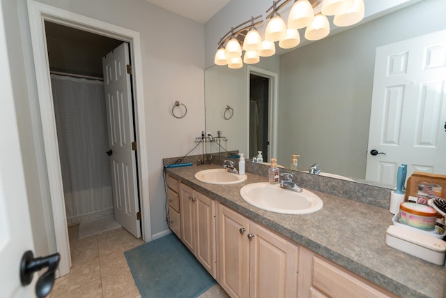 1527 Somerset Ct, Mount Pleasant, MI 48858 - bathroom with a sink, double vanity, and tile patterned flooring