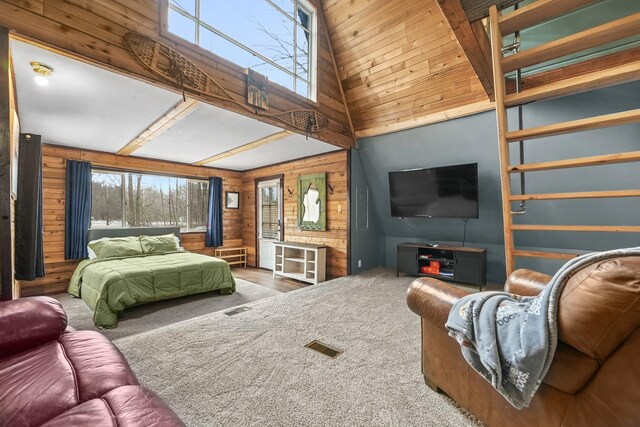9341 W M-115, Mesick, MI 49668 - carpeted bedroom with wood walls, high vaulted ceiling, multiple windows, and visible vents