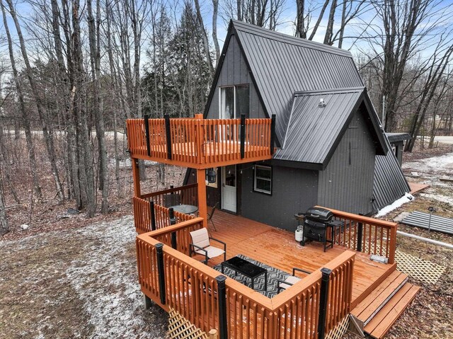 9341 W M-115, Mesick, MI 49668 - wooden terrace featuring grilling area