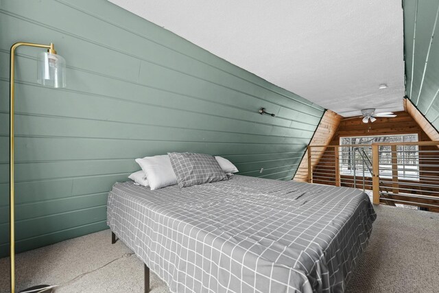 9341 W M-115, Mesick, MI 49668 - carpeted bedroom with wooden walls
