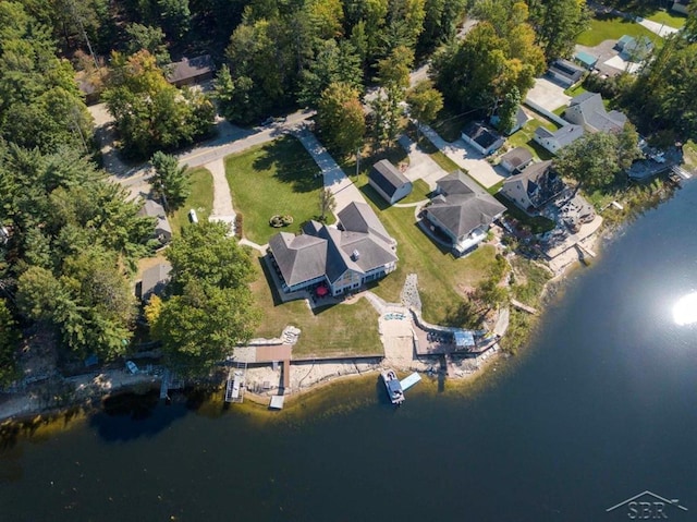 aerial view with a water view and a residential view