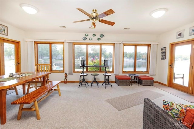 sunroom / solarium featuring visible vents