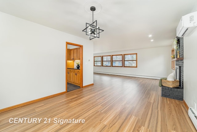 1804 Ardmore St, Midland, MI 48642 - unfurnished living room featuring a wall mounted AC, baseboard heating, light wood-style floors, a brick fireplace, and a chandelier