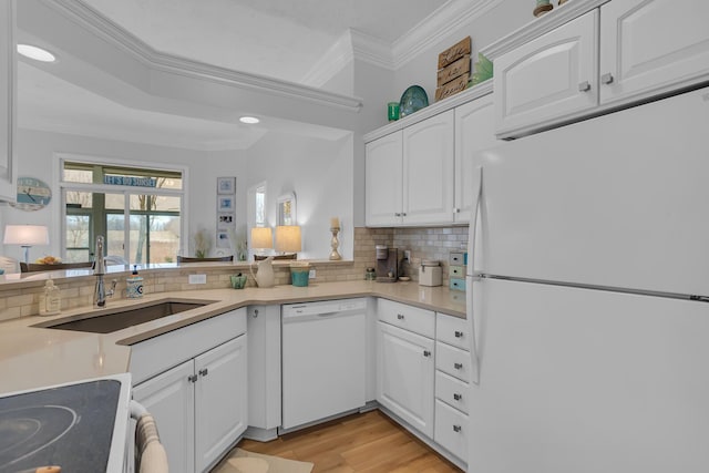 442 Constitution Ave, Brooklyn, MI 49230 - kitchen featuring white appliances, a sink, crown molding, backsplash, and white cabinets