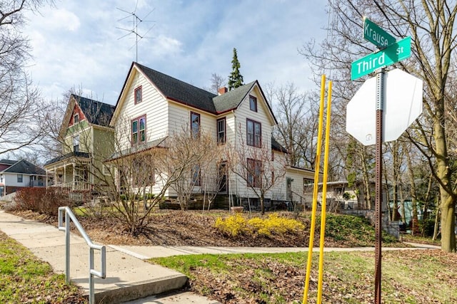 300 3rd St, Ann Arbor, MI 48103 - view of property exterior featuring a chimney