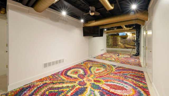 interior space with visible vents and baseboards