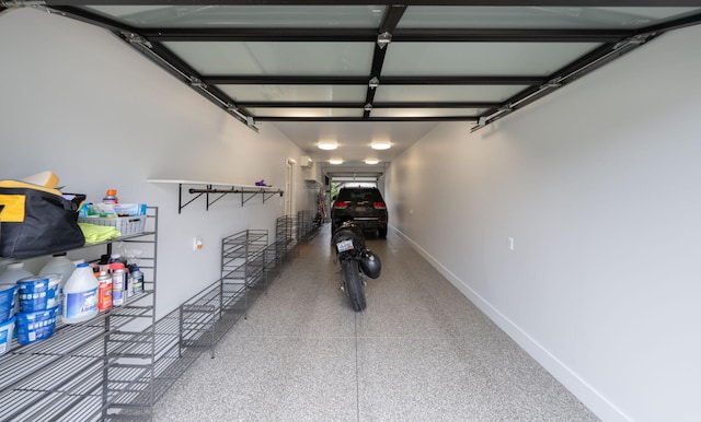 garage featuring baseboards