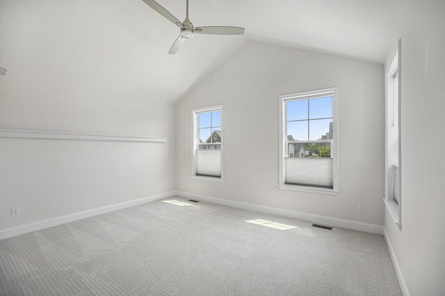 3092 N Spurway Dr, Ann Arbor, MI 48105 - carpeted spare room with ceiling fan, baseboards, and lofted ceiling