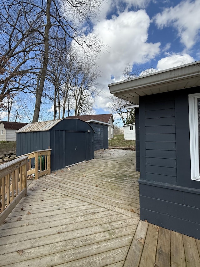 755 Bright Water Dr, Coldwater, MI 49036 - wooden terrace featuring a storage shed