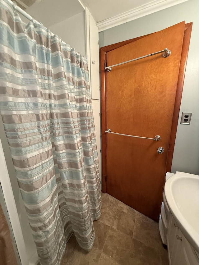 755 Bright Water Dr, Coldwater, MI 49036 - full bathroom featuring vanity, ornamental molding, and curtained shower