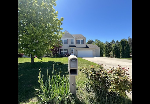 14750 Waypoint Pkwy, West Olive, MI 49460 - view of front of property featuring concrete driveway, a front lawn, and an attached garage
