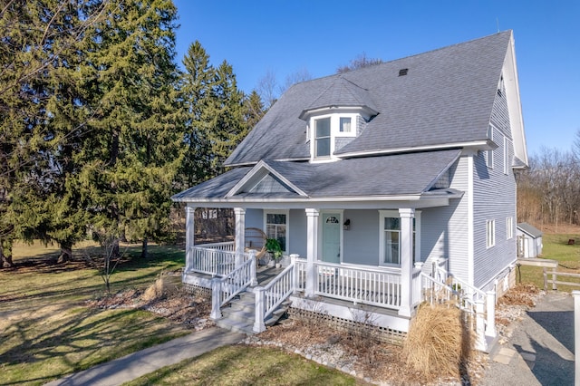 1856 N 56th Ave, Mears, MI 49436 - view of front of home with covered porch and roof with shingles