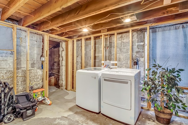 1856 N 56th Ave, Mears, MI 49436 - unfinished below grade area featuring washing machine and clothes dryer