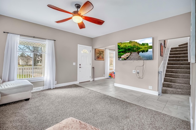 1856 N 56th Ave, Mears, MI 49436 - entrance foyer with stairs and ceiling fan
