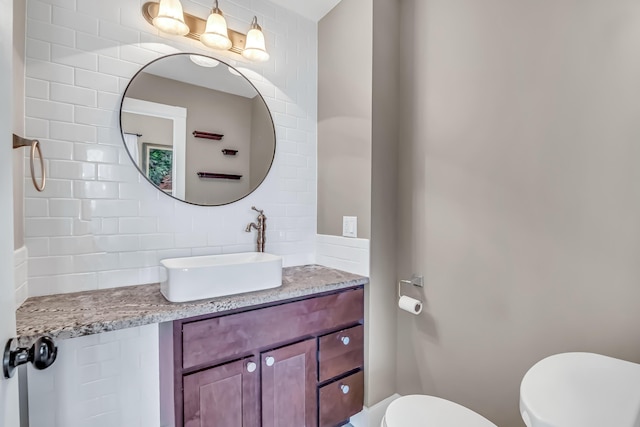1856 N 56th Ave, Mears, MI 49436 - half bathroom with backsplash and vanity