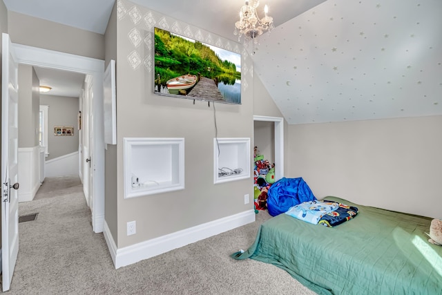 1856 N 56th Ave, Mears, MI 49436 - carpeted bedroom featuring a chandelier and lofted ceiling
