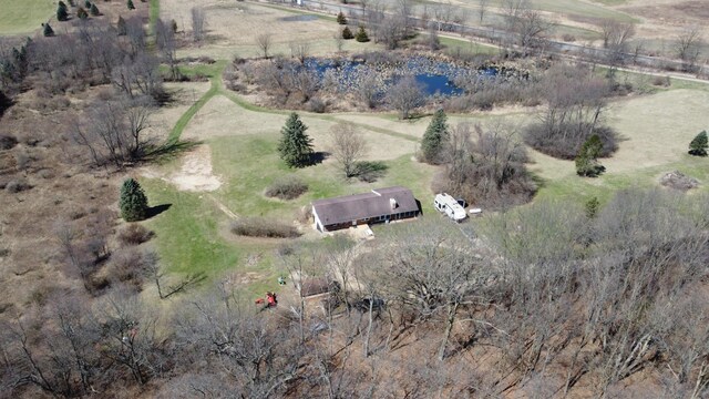 birds eye view of property featuring a rural view and a water view
