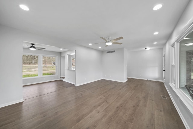 unfurnished living room featuring visible vents, recessed lighting, and ceiling fan