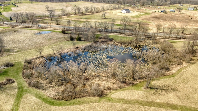 aerial view featuring a water view and a rural view