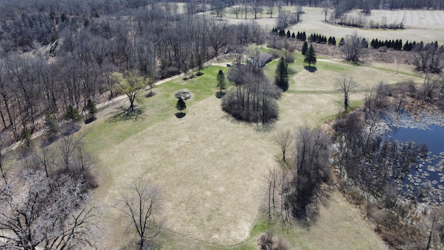 drone / aerial view featuring a water view and a rural view