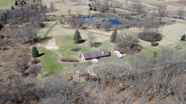 birds eye view of property featuring a rural view and a water view