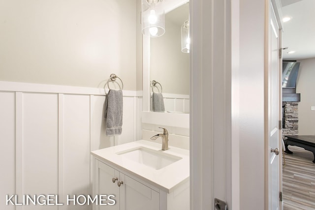 920 W Savidge St Unit 14, Spring Lake, MI 49456 - bathroom featuring vanity and wood finished floors