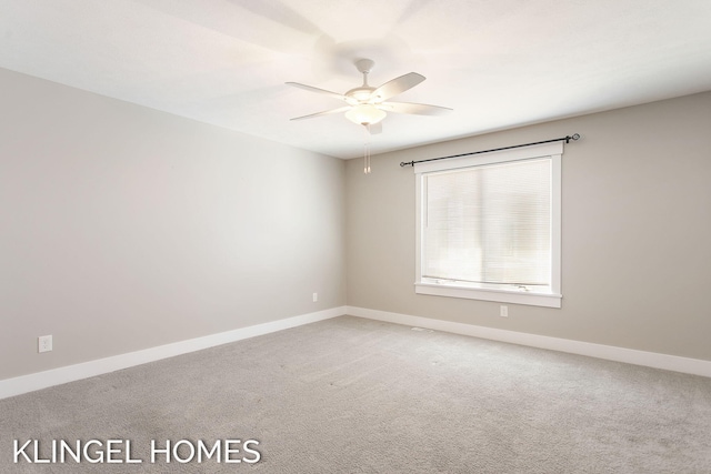 920 W Savidge St Unit 14, Spring Lake, MI 49456 - unfurnished room featuring ceiling fan and light colored carpet
