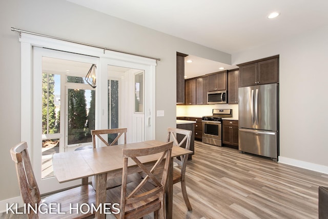 920 W Savidge St Unit 14, Spring Lake, MI 49456 - dining area featuring recessed lighting and light wood-type flooring