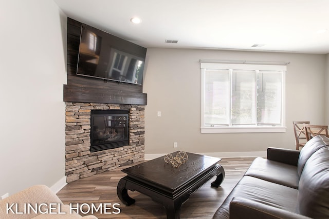 920 W Savidge St Unit 14, Spring Lake, MI 49456 - living room with a stone fireplace, wood finished floors, and recessed lighting