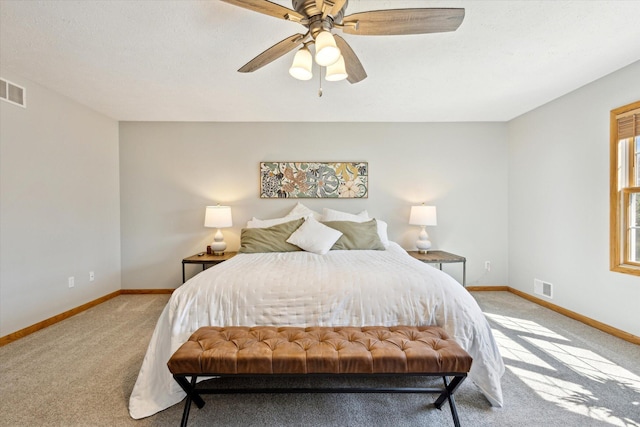 7101 River Glen Dr, Caledonia, MI 49316 - bedroom featuring light colored carpet, baseboards, a ceiling fan, and visible vents
