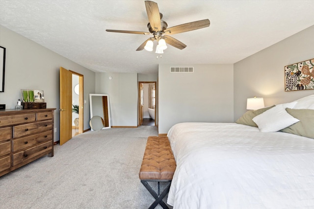 7101 River Glen Dr, Caledonia, MI 49316 - bedroom featuring visible vents, baseboards, a ceiling fan, and light colored carpet